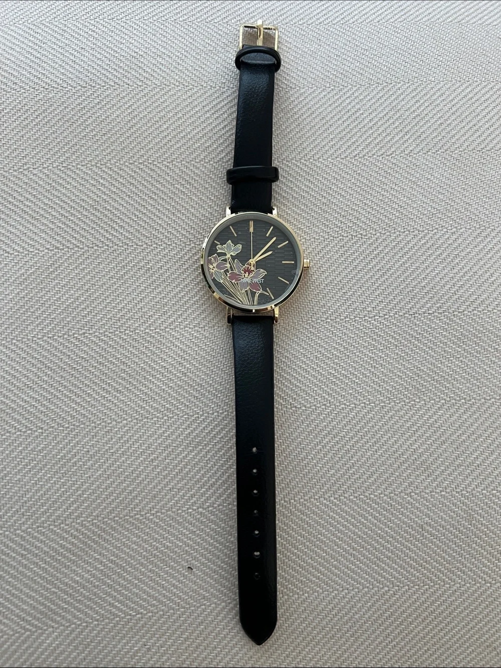 Nine West Women's Floral Dial Gold-Tone Watch with Black Leather Strap